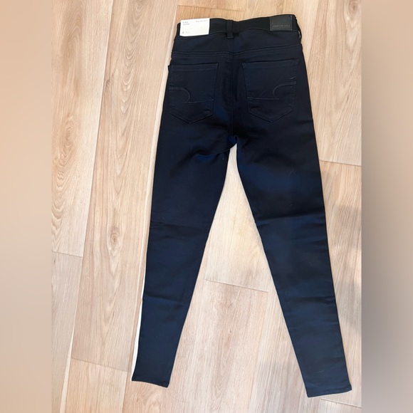 Black hi-rise NE(X)T level jegging with side stripe. - Picture 2 of 3